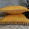 Komplet 2 szt poszewki 40x40 musztardowe z pomponami 100% bawełna HandmadebyAmia